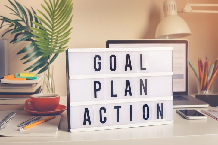 Goal,plan,action text on light box on desk table in home office.Business motivation or inspiration,performance of human concepts ideas (Goal,plan,action text on light box on desk table in home office.Business motivation or inspiration,performance of h